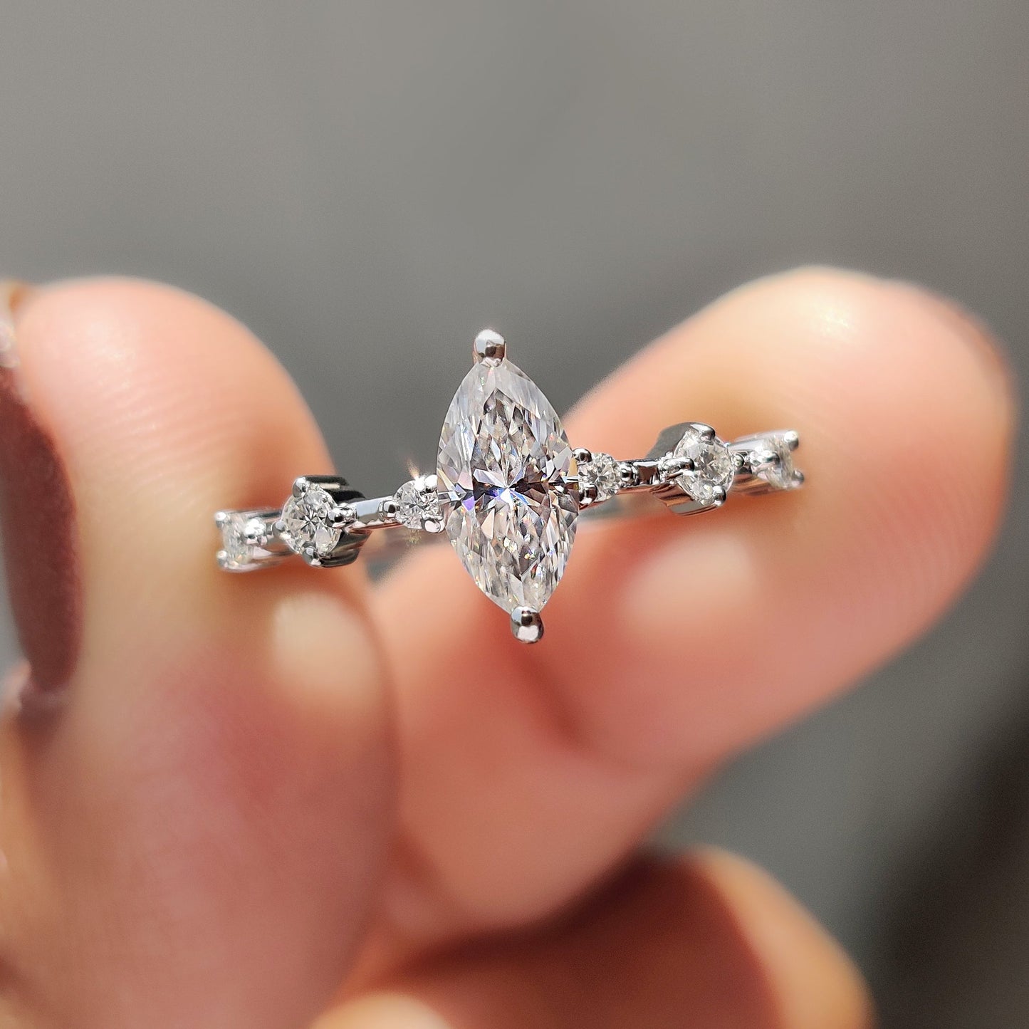 Moissanite Marquise Ring In Round Prong Setting