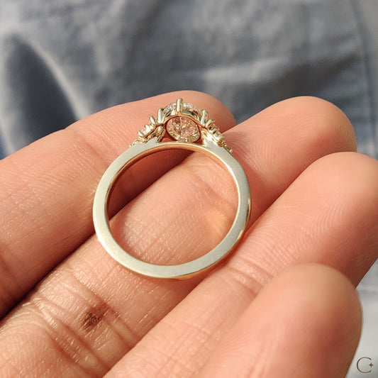 Oval Cut Engagement Ring In Cluster Setting