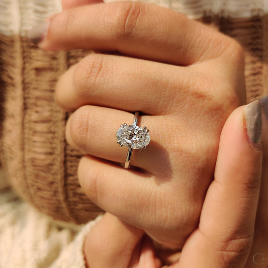 Oval Shaped Diamond Engagement Ring In Solitaire Style