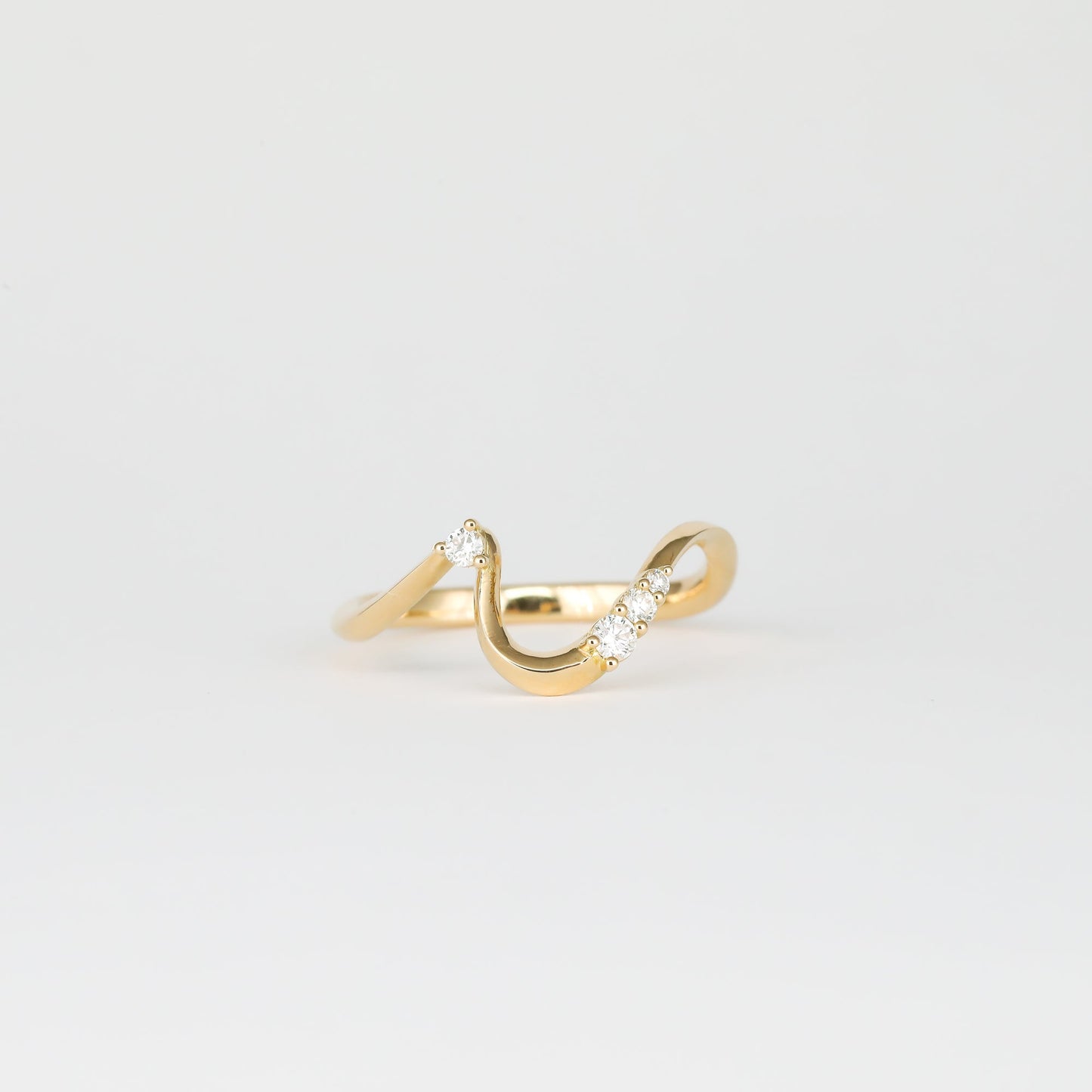 0.11 TCW Round Shaped Waved Moissanite Wedding Band