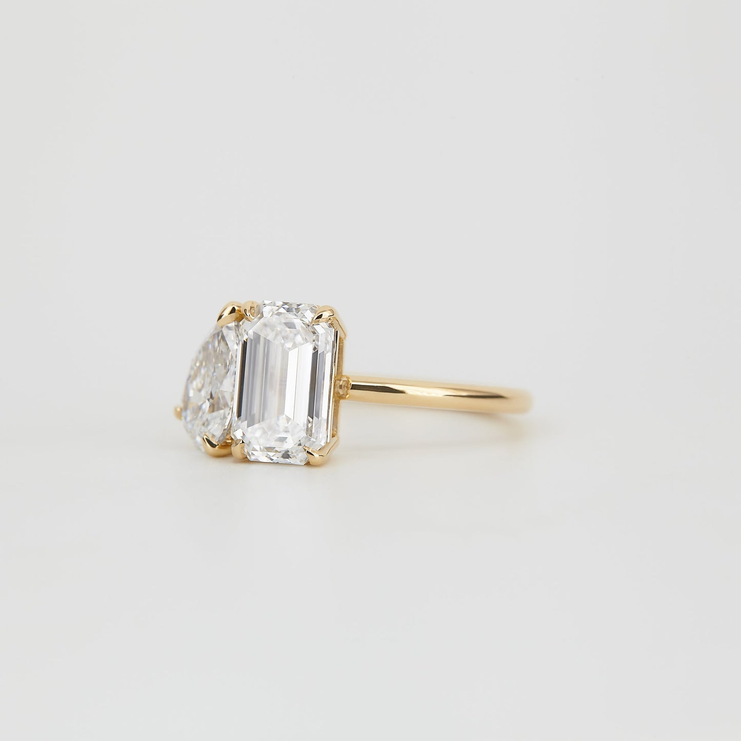 3.34 TCW Emerald & Pear Shaped Toi Et Moi Moissanite Engagement Ring