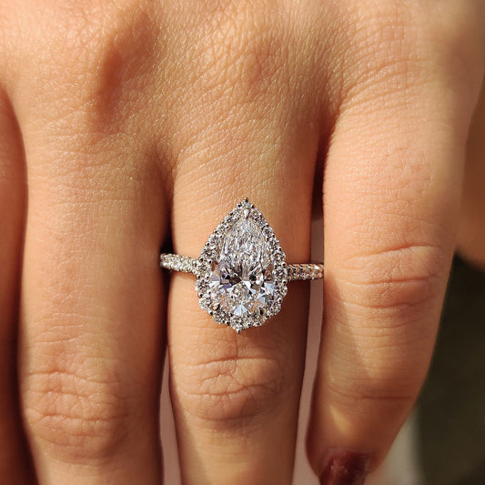 Pear Shaped Halo Engagement Ring In White Gold