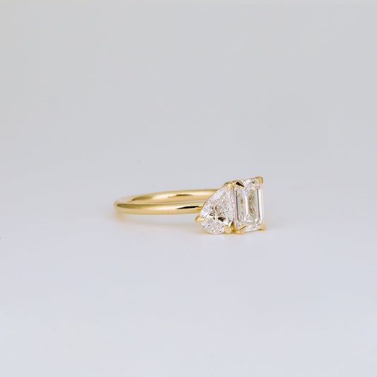 1.47 TCW Emerald & Pear Shaped Toi Et Moi Moissanite Engagement Ring
