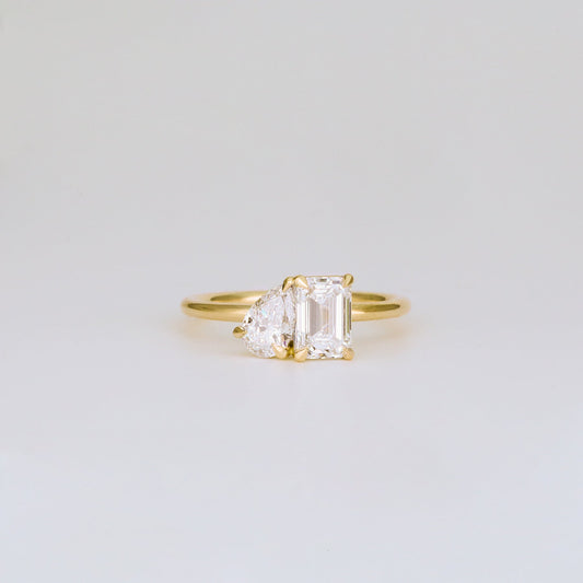1.47 TCW Emerald & Pear Shaped Toi Et Moi Moissanite Engagement Ring