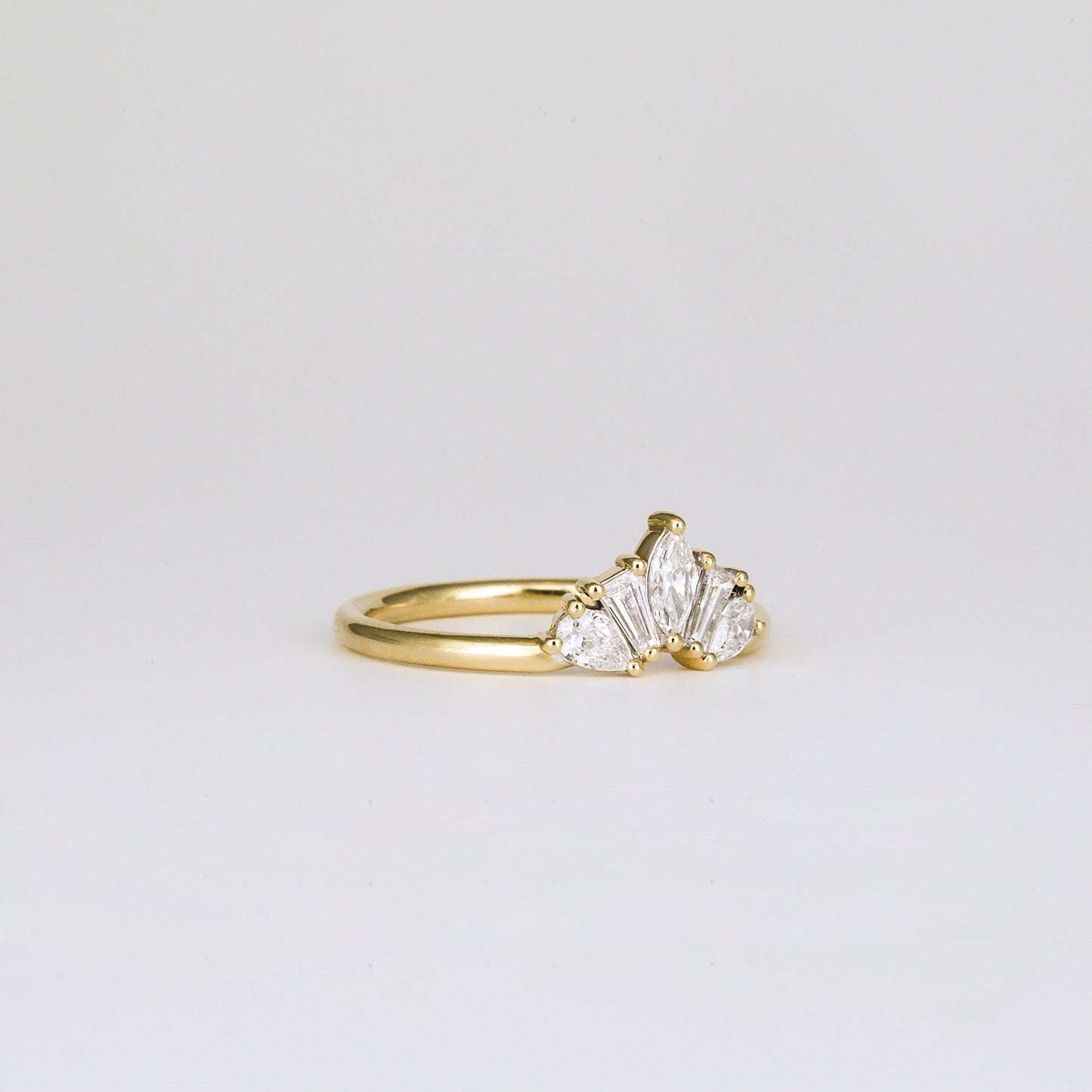 0.45 TCW Pear, Tapered Baguette & Marquise Shaped Multi Stone Moissanite Wedding Band