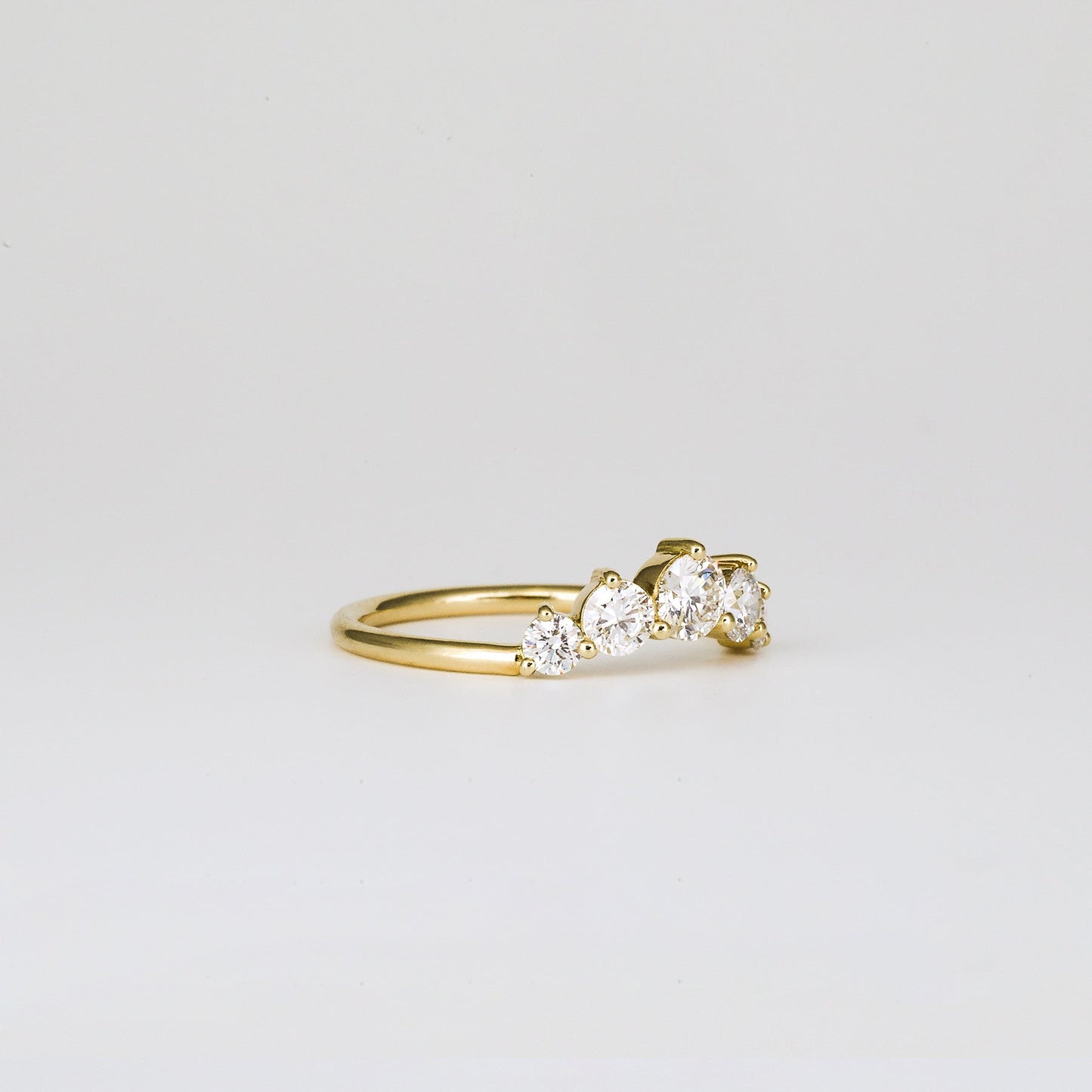 0.72 TCW Round Shaped Five Stone Moissanite Wedding Band