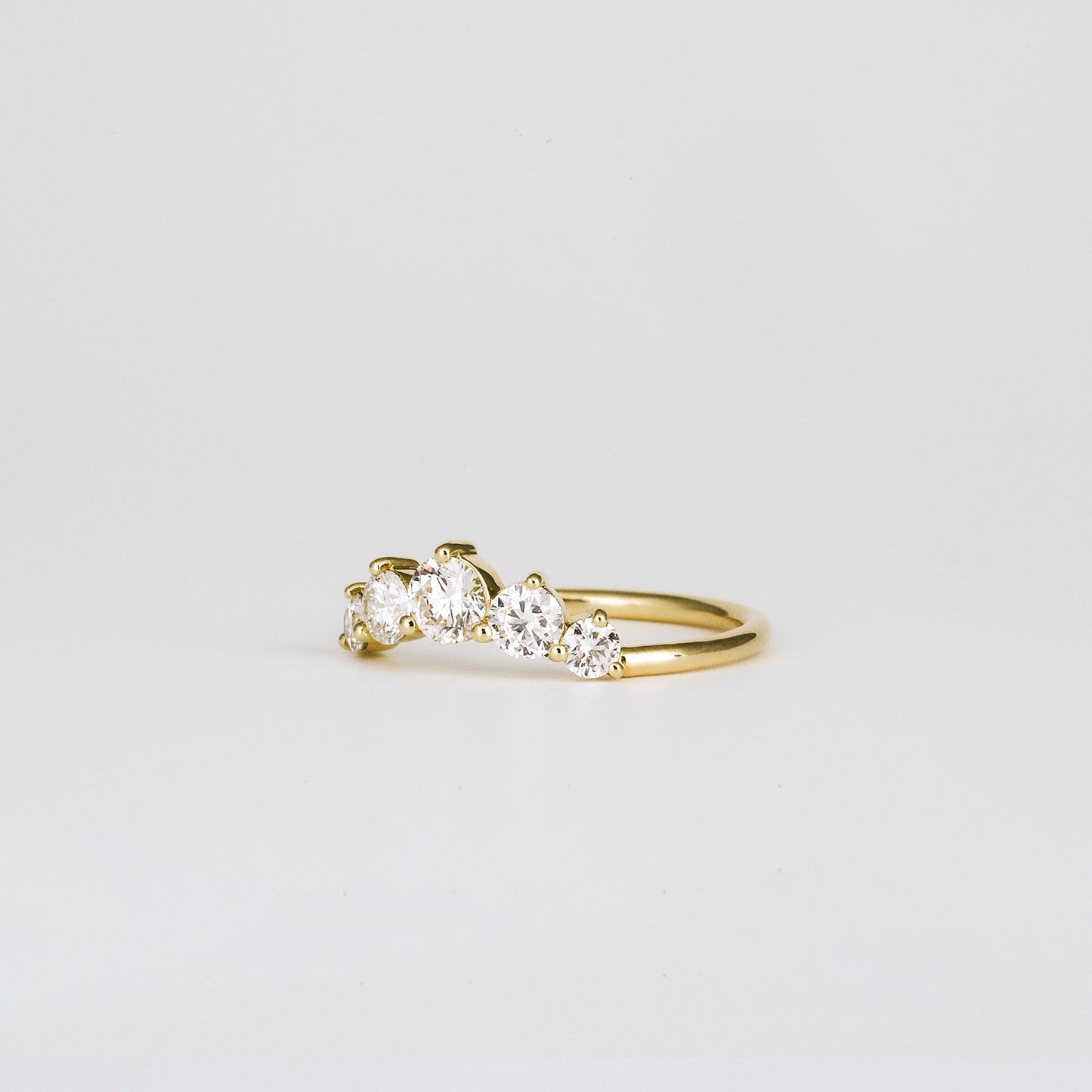 0.72 TCW Round Shaped Five Stone Moissanite Wedding Band