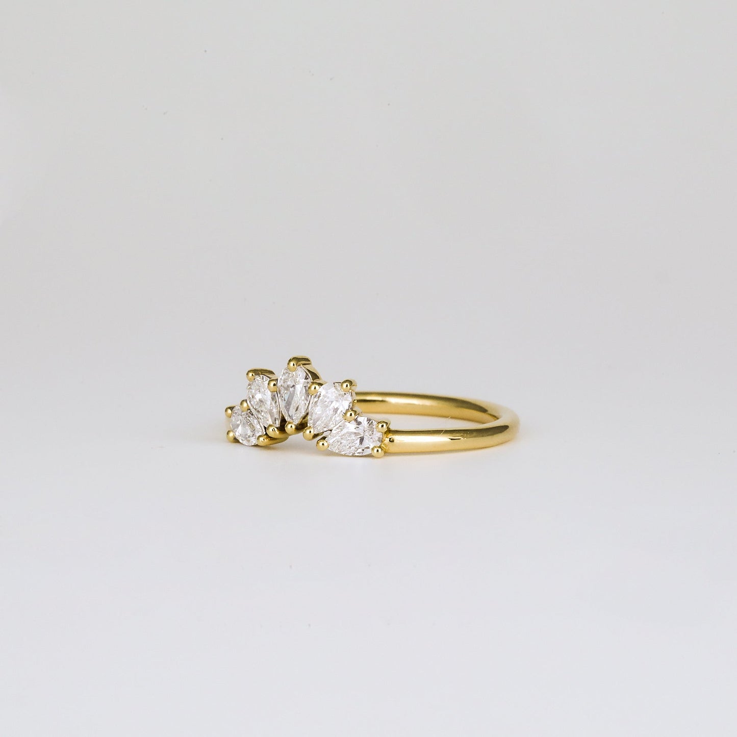 0.45 TCW Pear Shaped Crown Moissanite Wedding Band