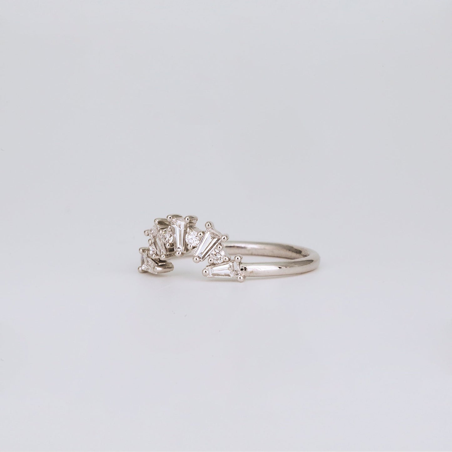 0.48 TCW Tapered Baguette & Round Shaped Curved Moissanite Wedding Band
