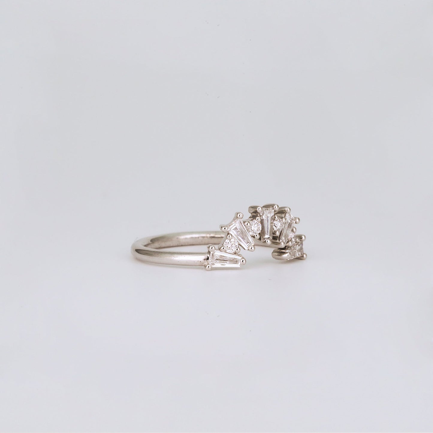 0.48 TCW Tapered Baguette & Round Shaped Curved Moissanite Wedding Band