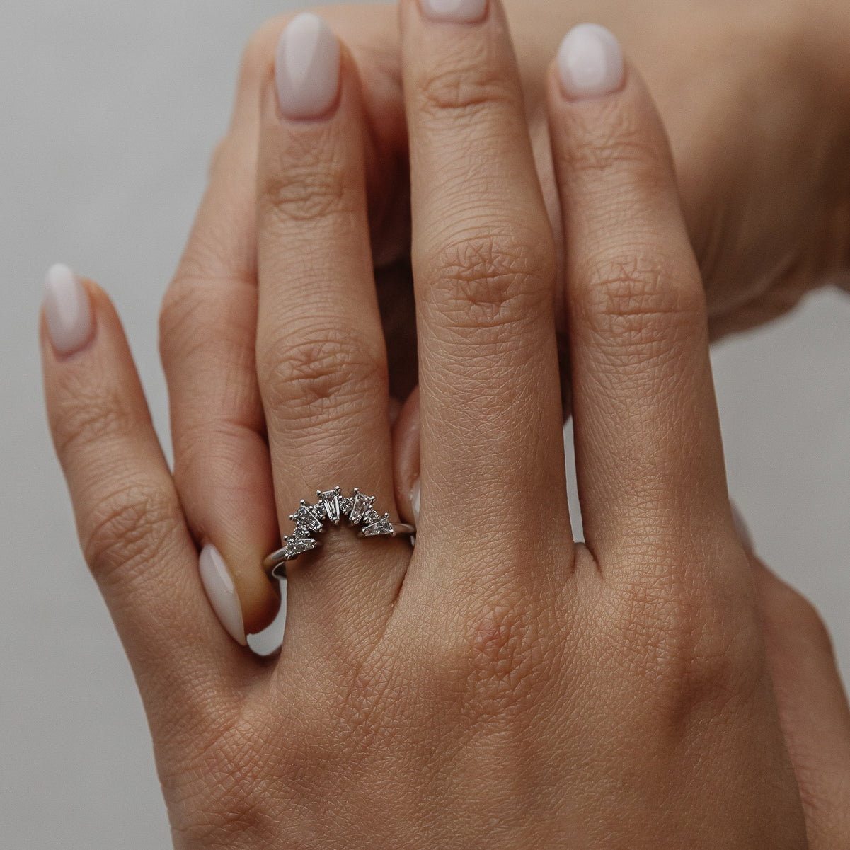 0.48 TCW Tapered Baguette & Round Shaped Curved Moissanite Wedding Band