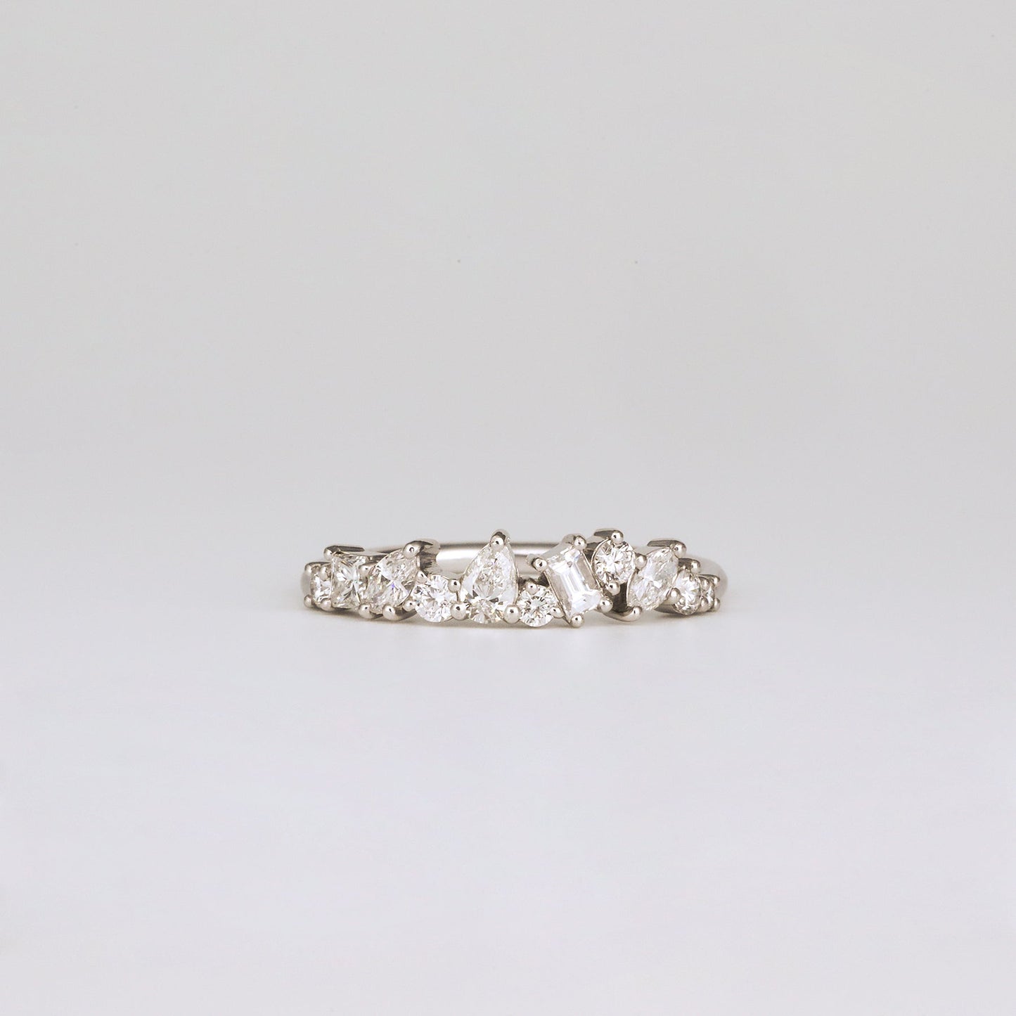 0.57 TCW Round, Baguette, Pear & Marquise Shaped Multi Stone Moissanite Wedding Band