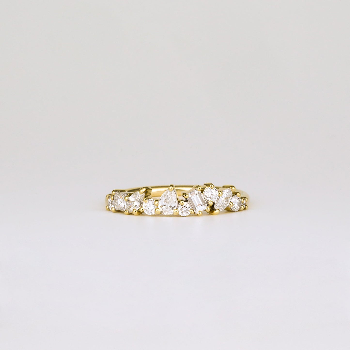 0.57 TCW Round, Baguette, Pear & Marquise Shaped Multi Stone Moissanite Wedding Band