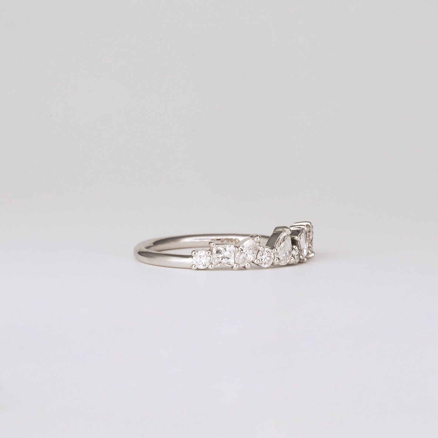 0.57 TCW Round, Baguette, Pear & Marquise Shaped Multi Stone Moissanite Wedding Band