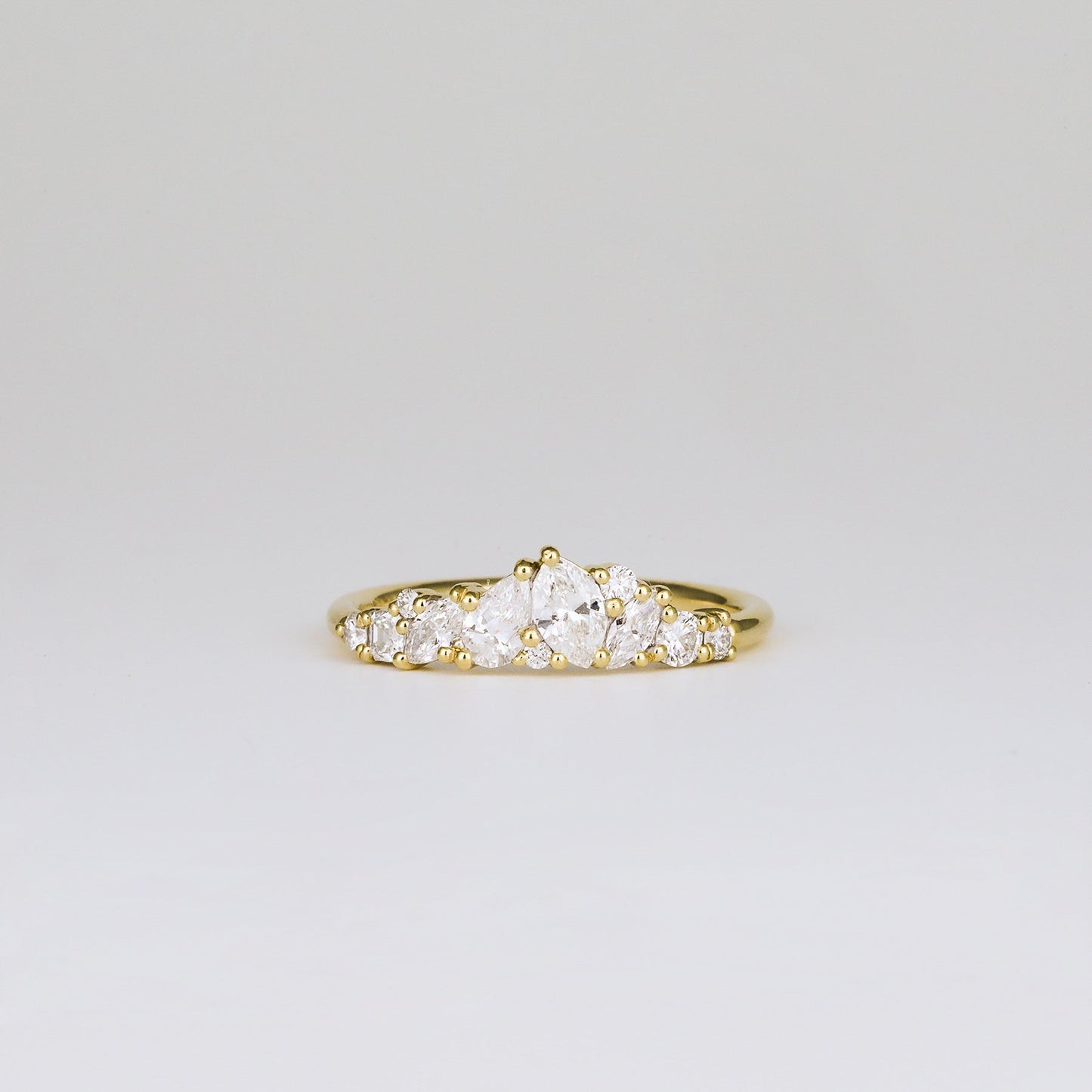 0.61 TCW Baguette, Pear, Marquise & Round Shaped Multi Stone Moissanite Wedding Band