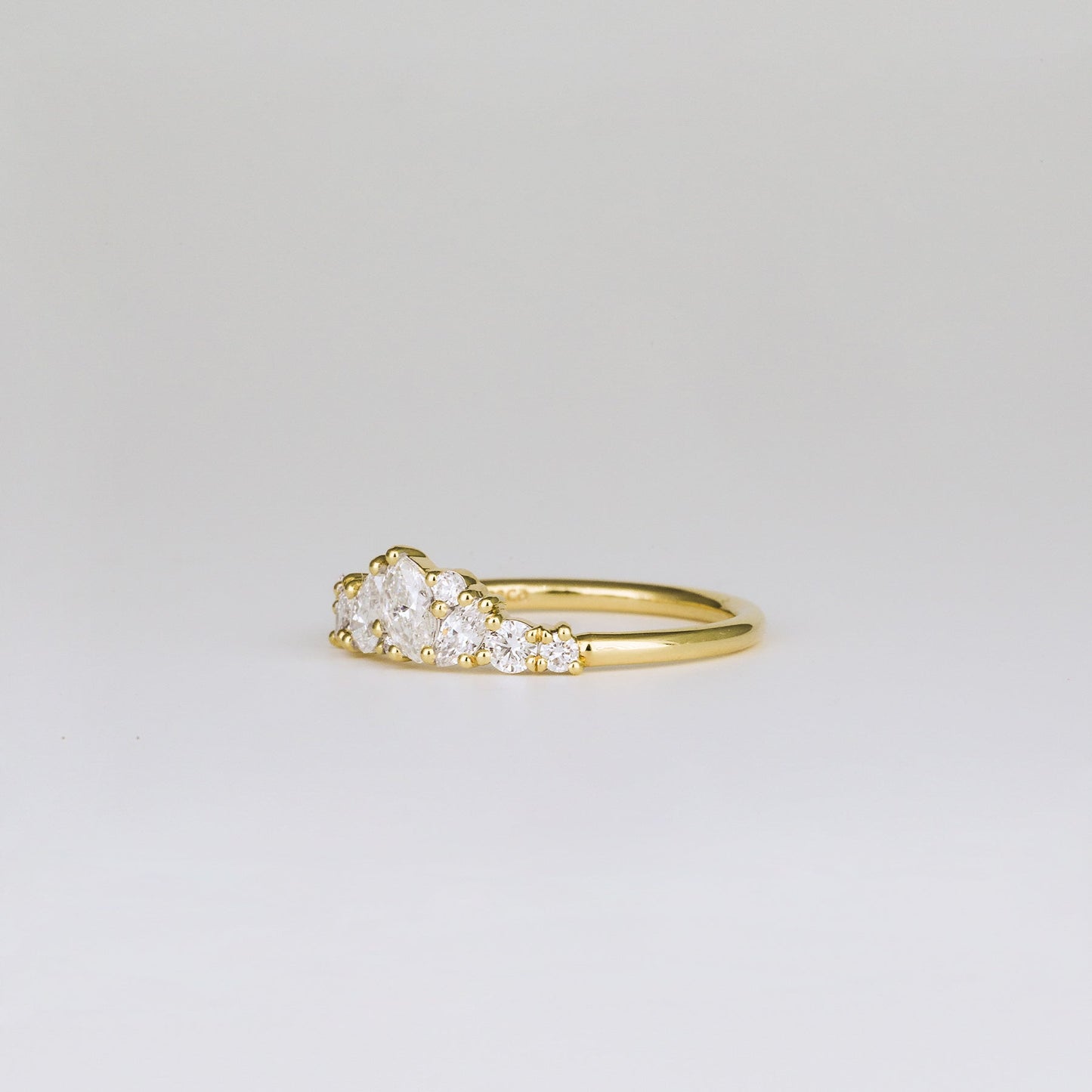 0.61 TCW Baguette, Pear, Marquise & Round Shaped Multi Stone Moissanite Wedding Band