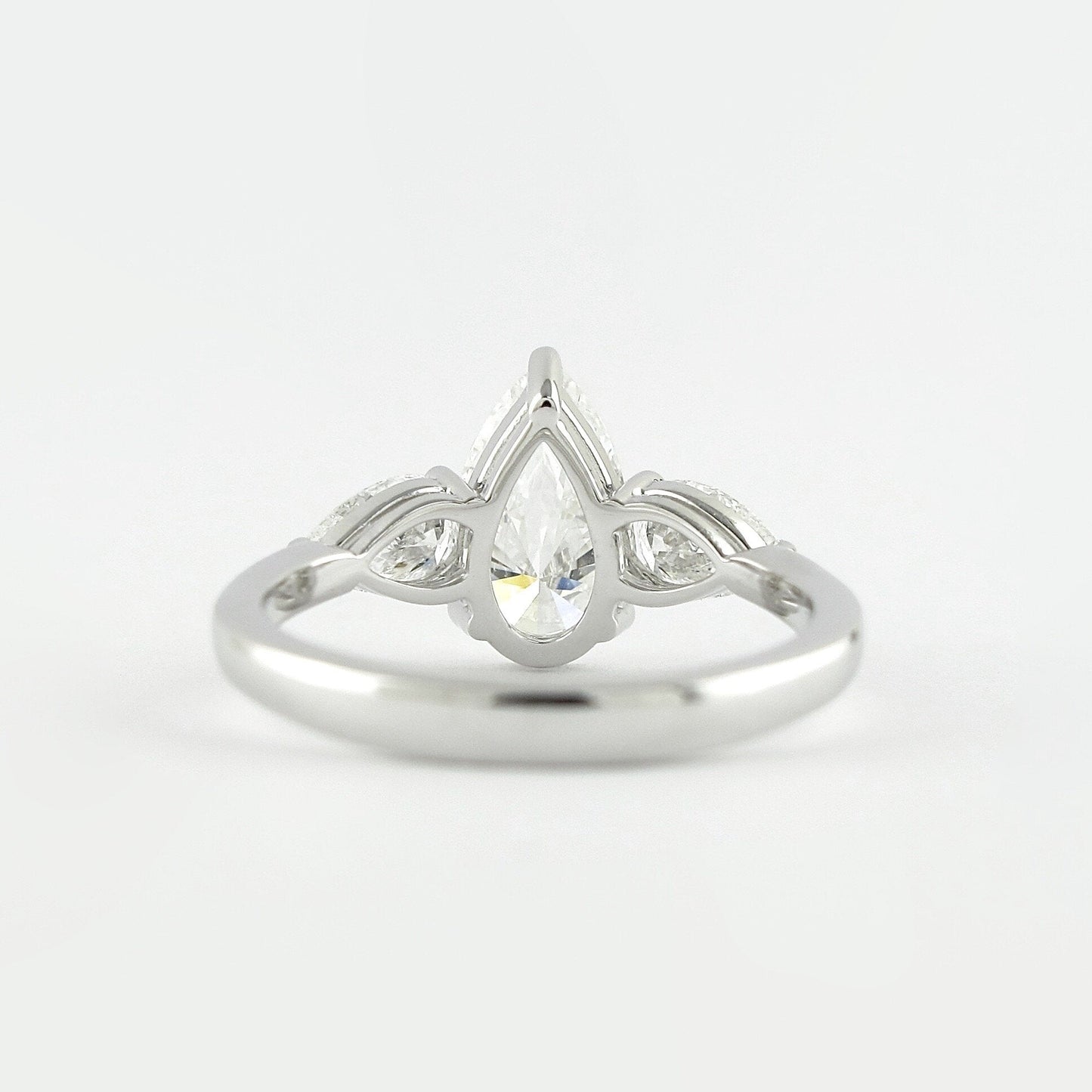 1.50 CT Pear Cut Three Stone Style Moissanite Engagement Ring 5
