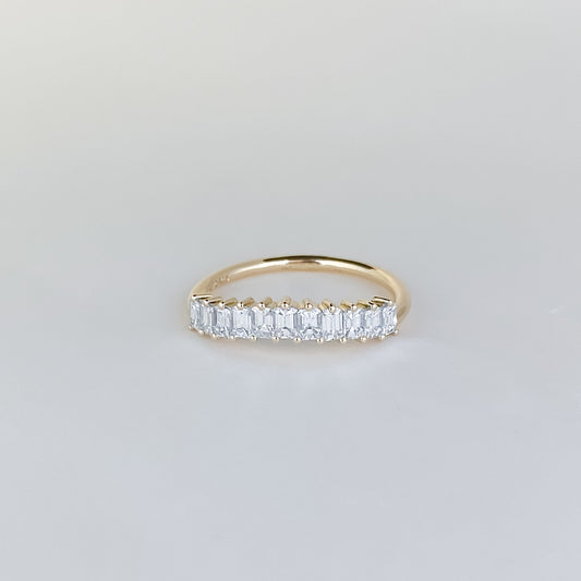 0.68 TCW Emerald Shaped Curved Moissanite Wedding Band