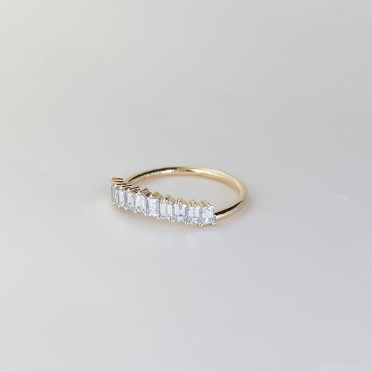 0.68 TCW Emerald Shaped Curved Moissanite Wedding Band