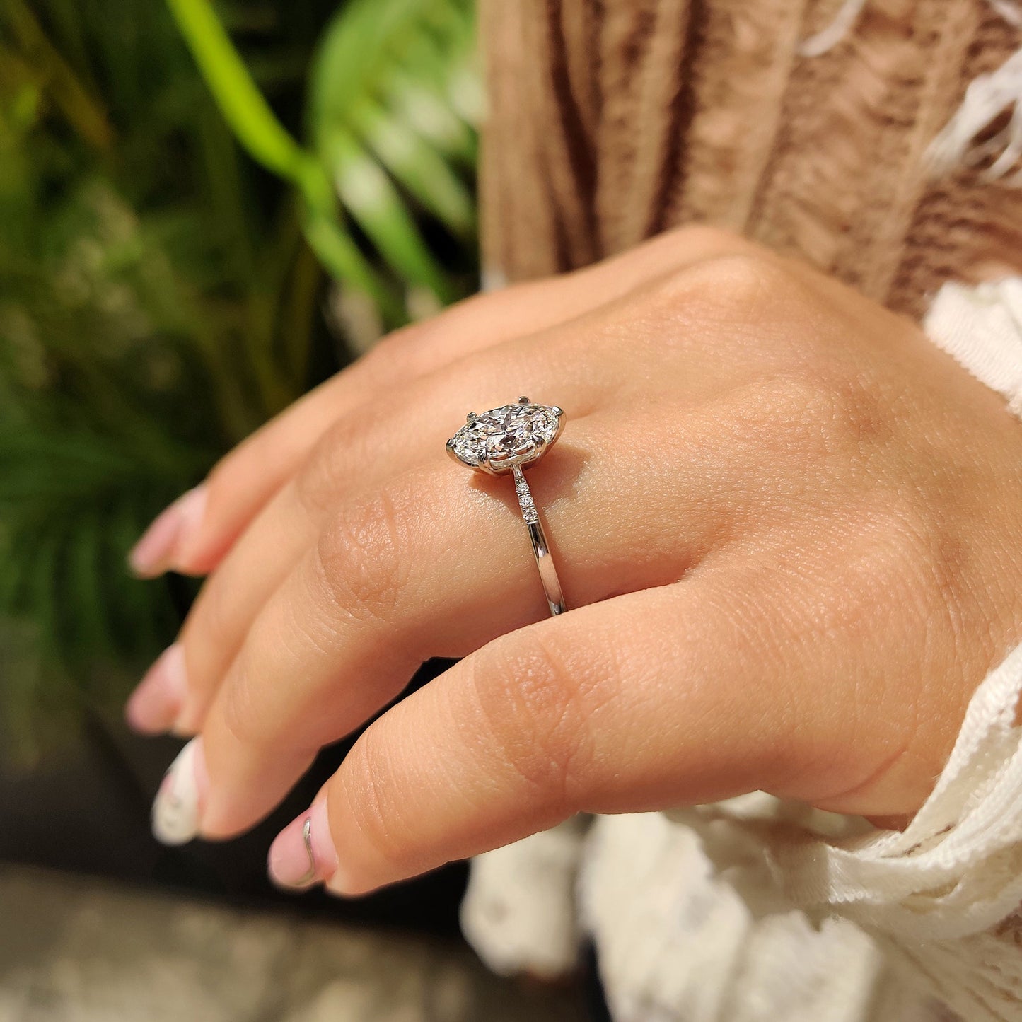 Oval Cut Diamond Engagement Ring With Pave Setting