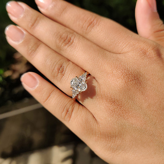 Oval Cut Cathedral Setting Engagement Ring