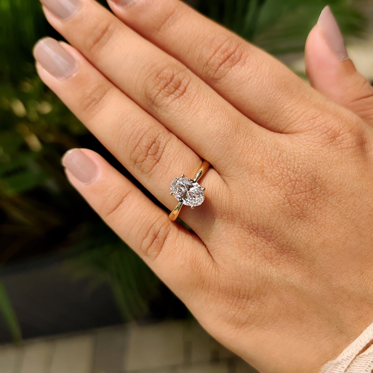 Oval Cut Engagement Ring In Hidden Halo Style