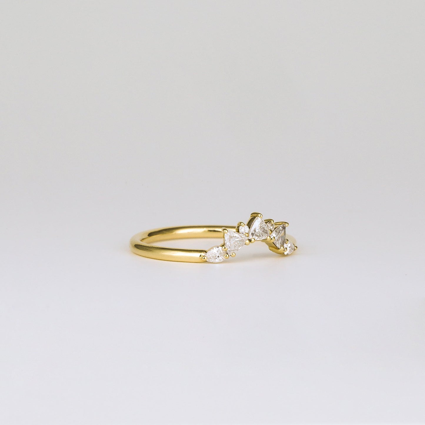 0.30 TCW Round & Trillion Shaped Curved Moissanite Wedding Band