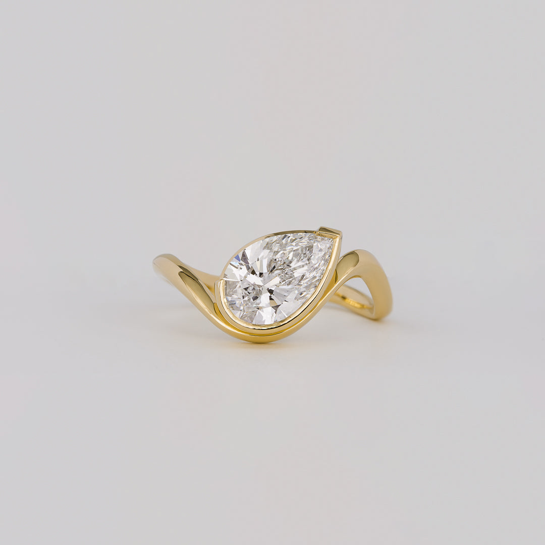 1.54 CT Pear Shaped Bezel Moissanite Engagement Ring