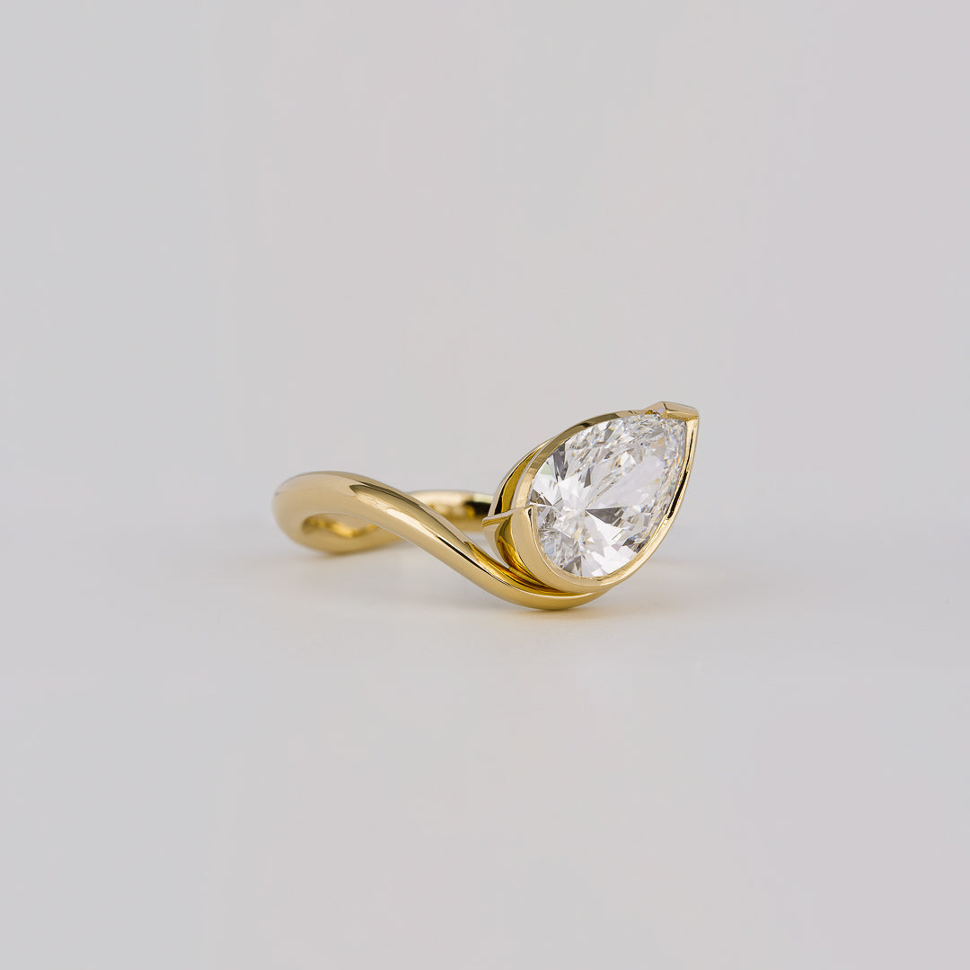 1.54 CT Pear Shaped Bezel Moissanite Engagement Ring