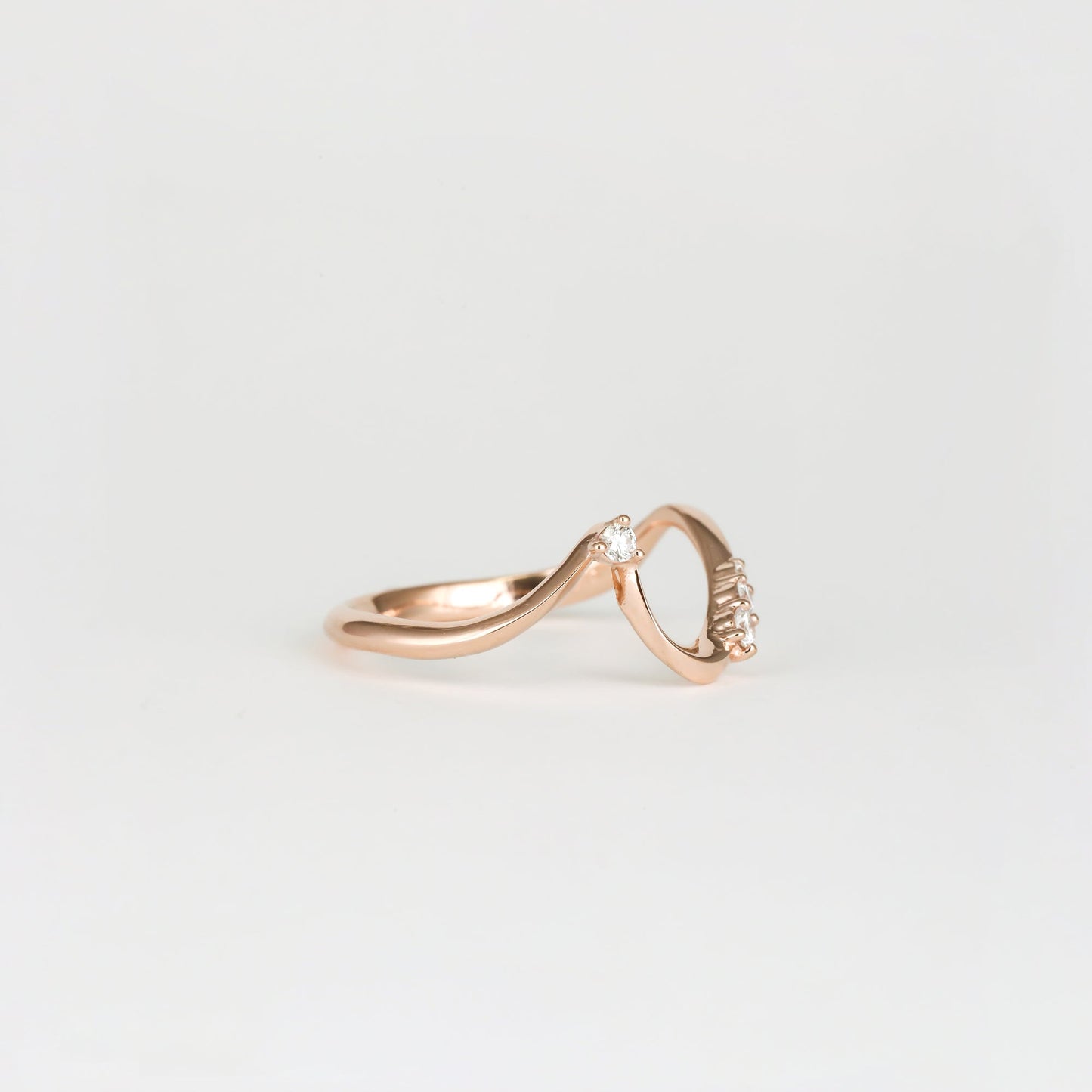 0.11 TCW Round Shaped Waved Moissanite Wedding Band