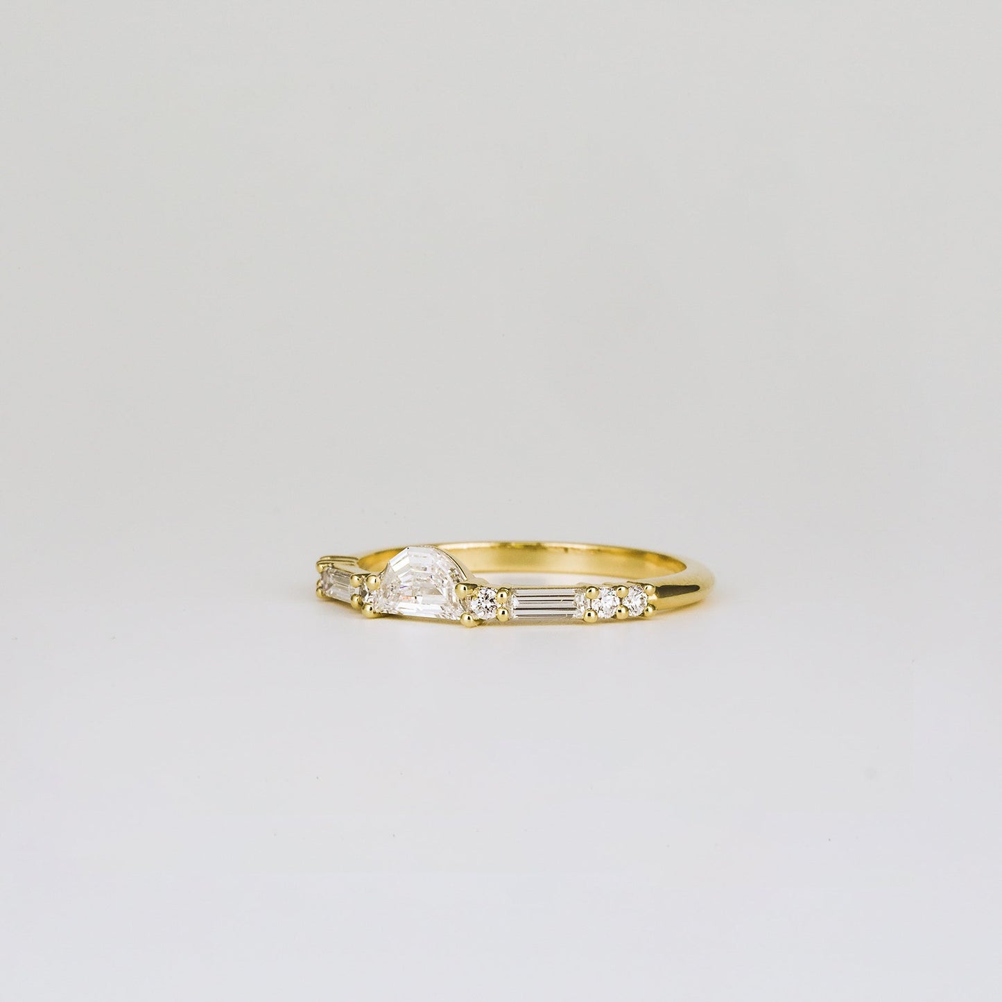 0.40 TCW Round, Baguette & Half Moon Shaped Half Eternity Moissanite Wedding Band