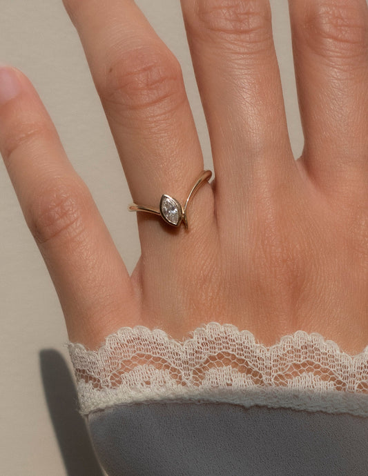 0.45 CT Marquise Moissanite Engagement Ring with Swirl Solitaire & Bezel Minimal Design