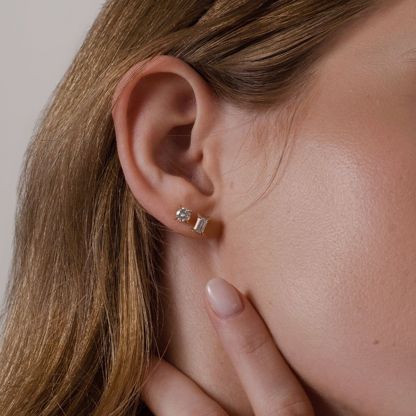 0.50 TCW Emerald Cut Moissanite Stud Earrings in Gold