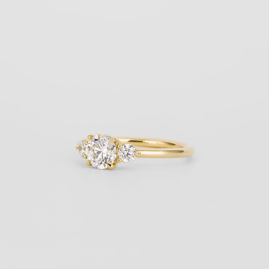 0.72 CT Round Shaped Three Stone Moissanite Engagement Ring