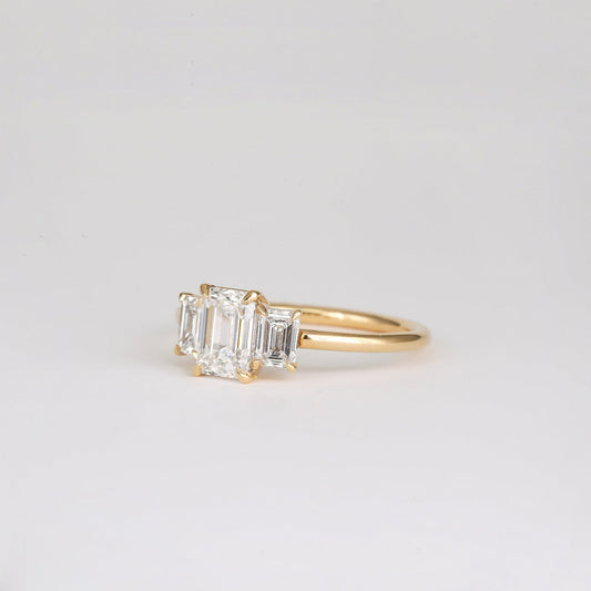 0.90 CT Emerald Shaped Three Stone Moissanite Engagement Ring