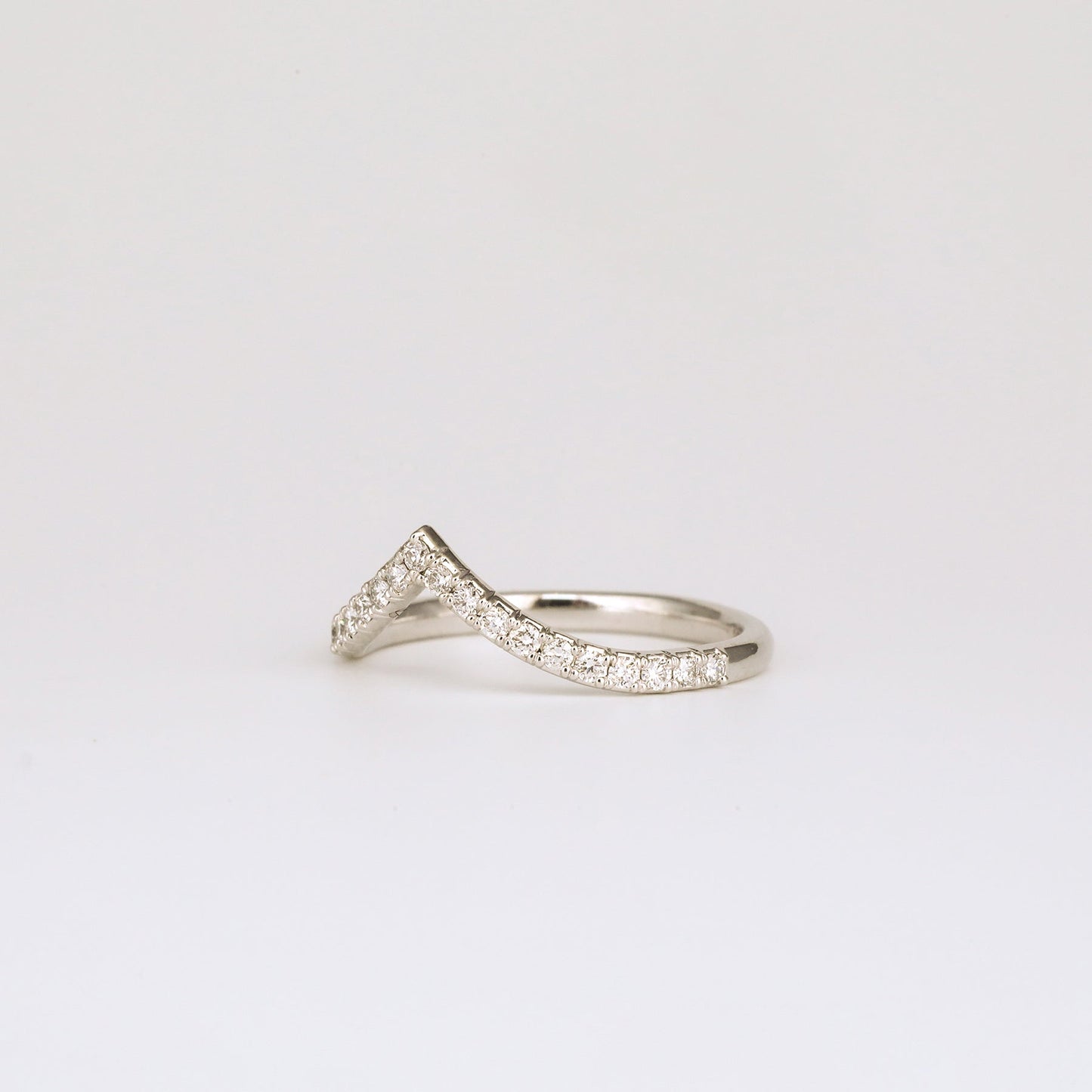 0.20 TCW Round Shaped Curved Moissanite Wedding Band