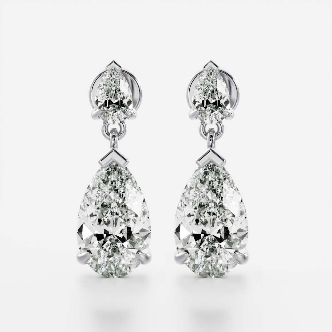 1.2 TCW Pear Cut Moissanite Dangles Earrings in Gold