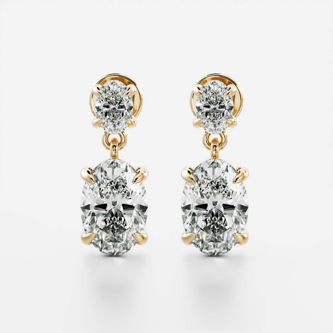 1.2 TCW Oval Cut Moissanite Dangles Earrings in Gold