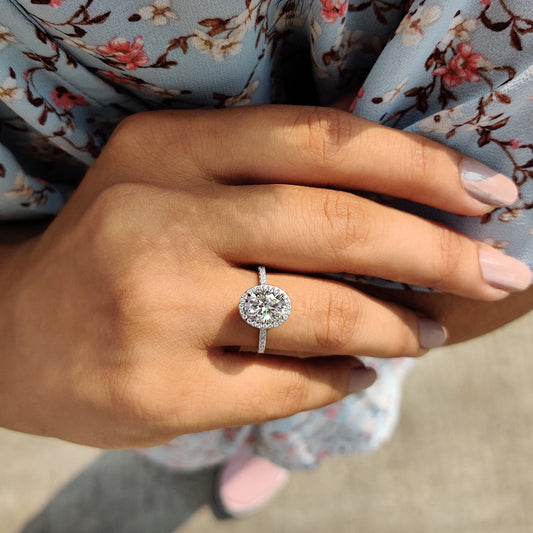 Oval Cut Hidden Halo Engagement Ring In White Gold