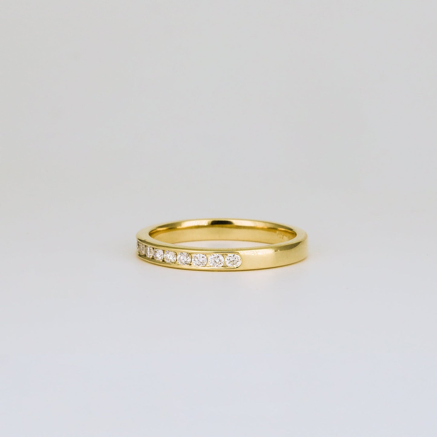 0.32 TCW Round Shaped Half Eternity Moissanite Wedding Band