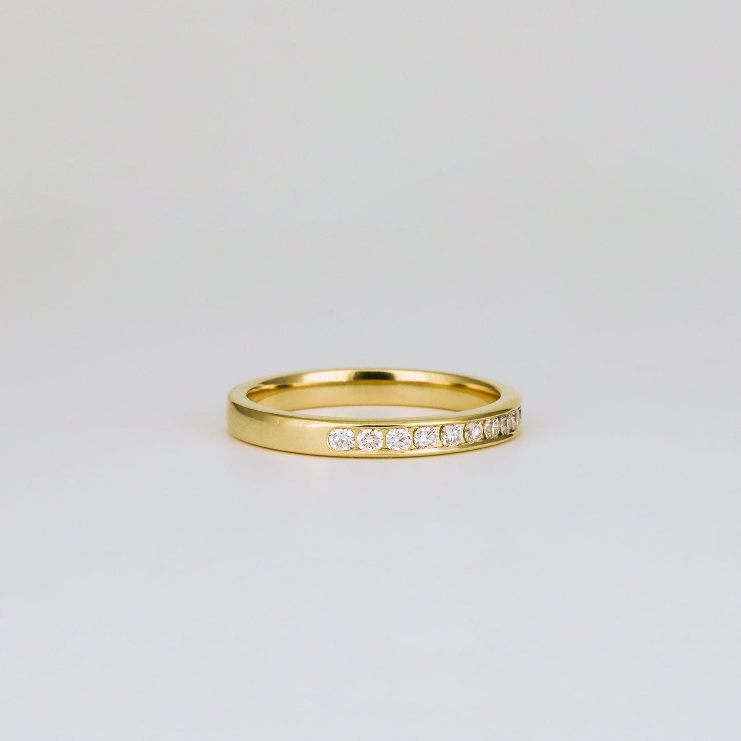0.32 TCW Round Shaped Half Eternity Moissanite Wedding Band