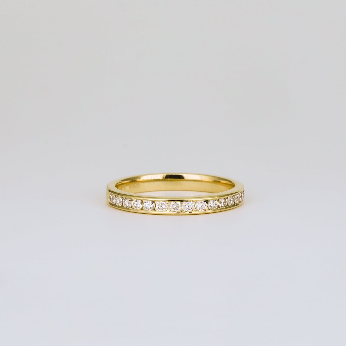 0.32 TCW Round Shaped Half Eternity Moissanite Wedding Band