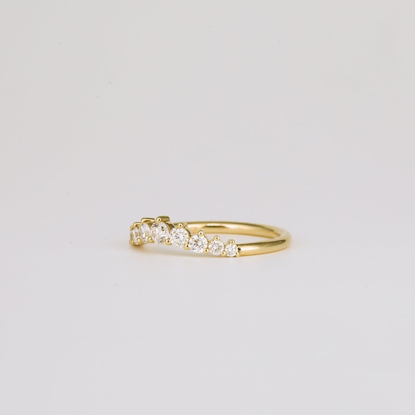 0.31 TCW Round Shaped Curved Moissanite Wedding Band