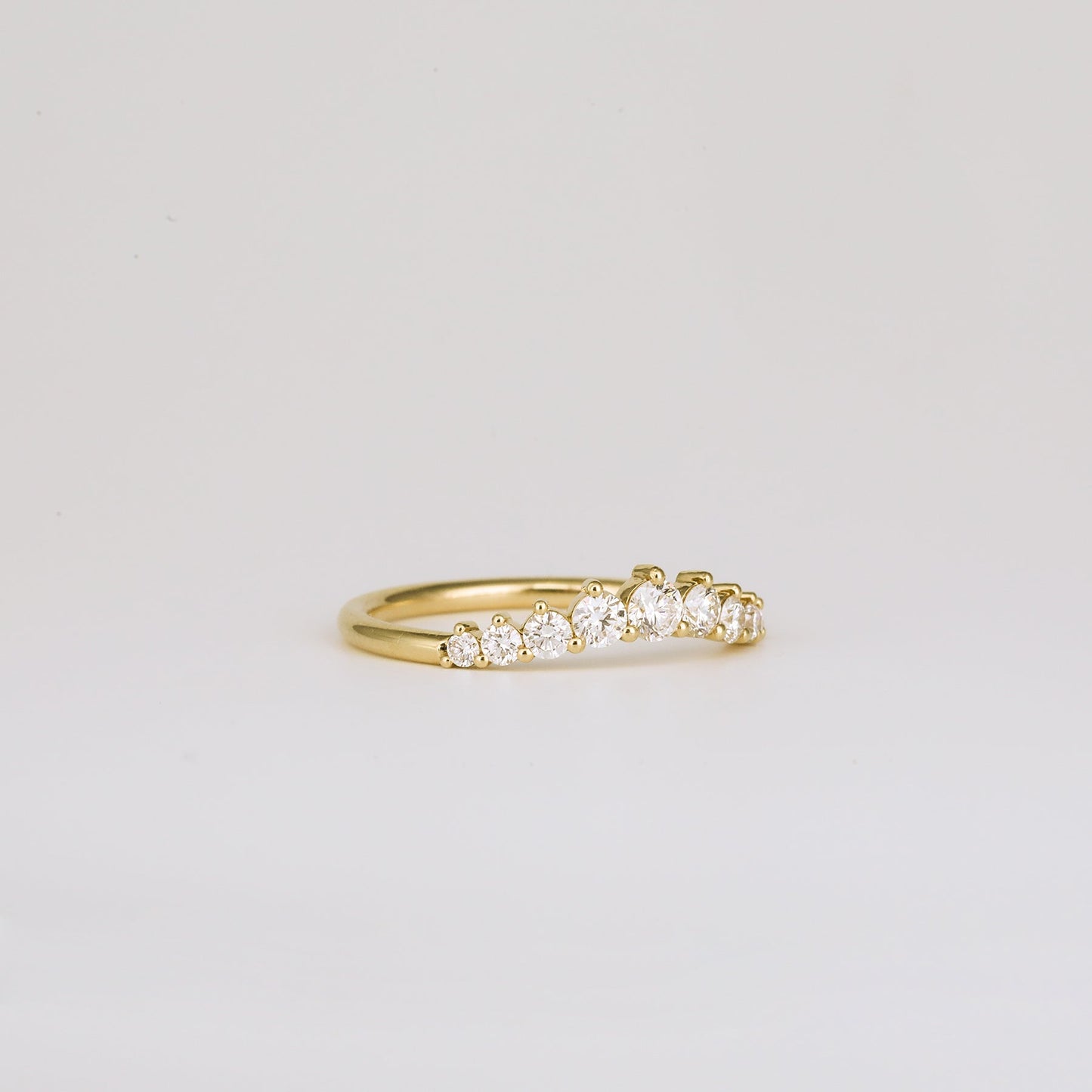 0.31 TCW Round Shaped Curved Moissanite Wedding Band