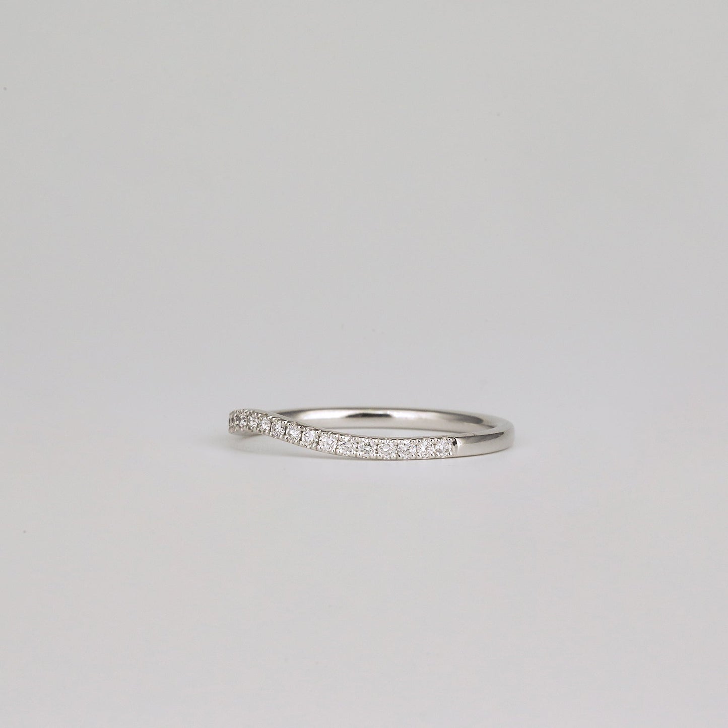 0.21 TCW Round Shaped Curved Moissanite Wedding Band