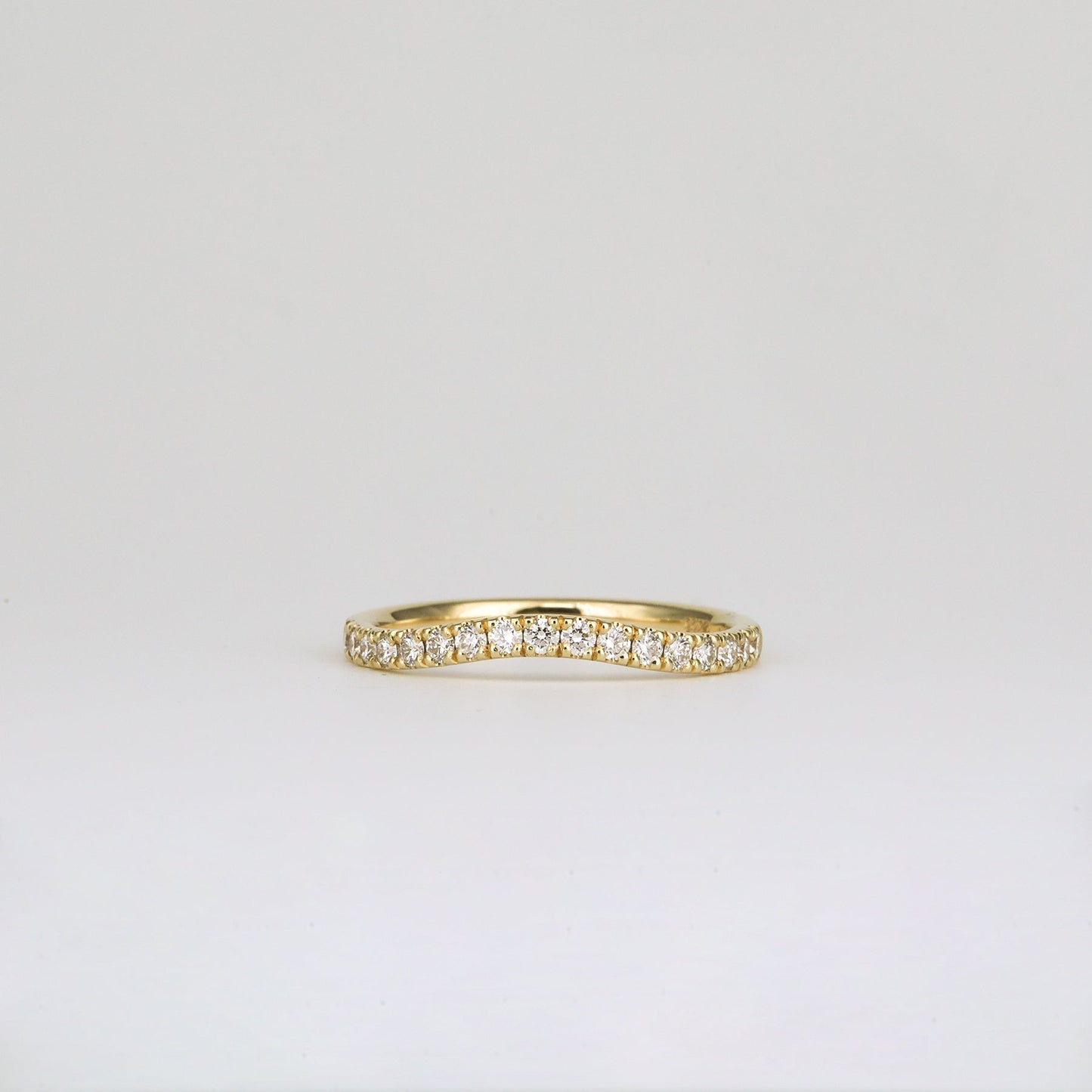 0.33 TCW Round Shaped Curved Moissanite Wedding Band