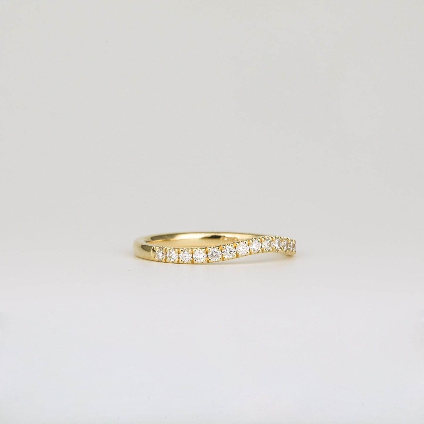 0.33 TCW Round Shaped Curved Moissanite Wedding Band