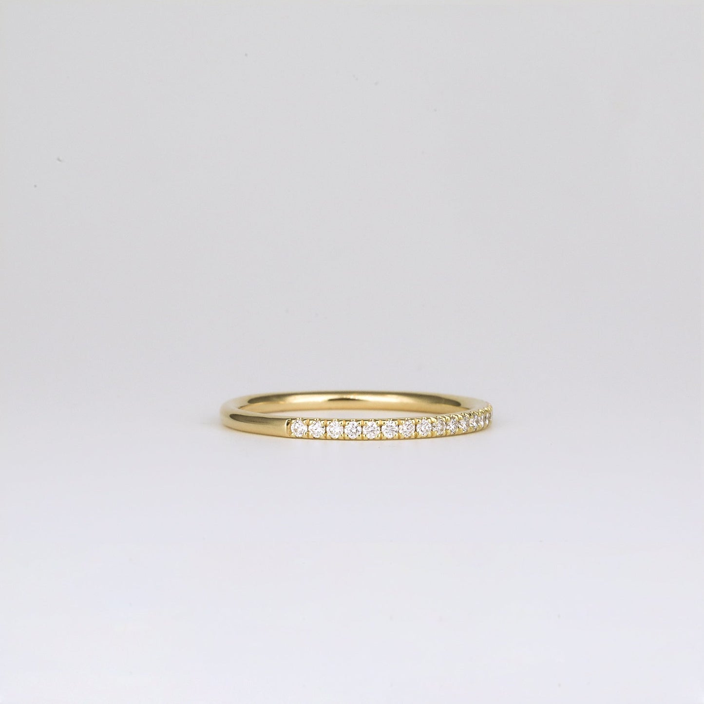0.21 TCW Round Shaped Half Eternity Moissanite Wedding Band