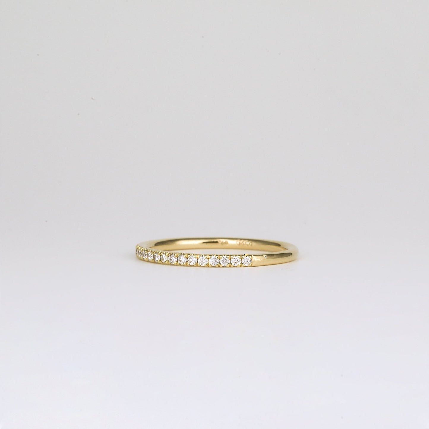 0.21 TCW Round Shaped Half Eternity Moissanite Wedding Band