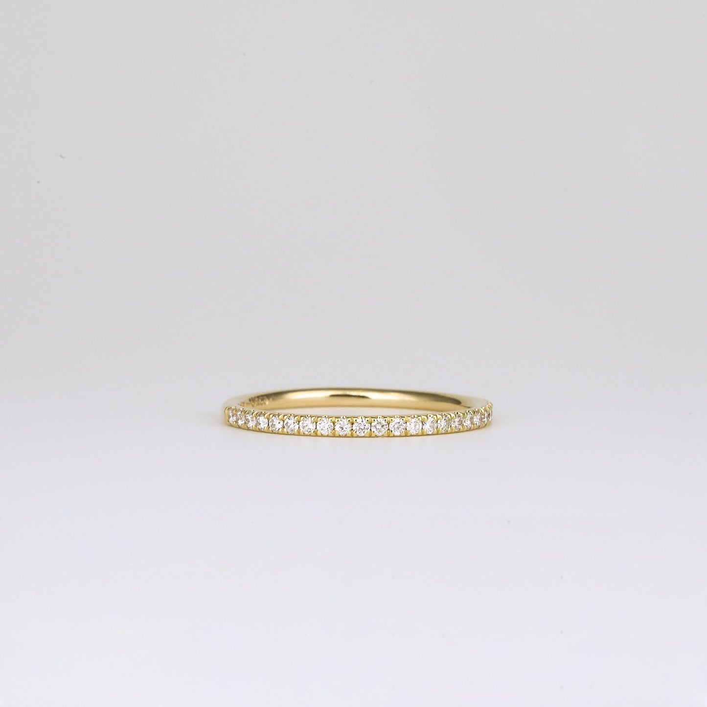 0.21 TCW Round Shaped Half Eternity Moissanite Wedding Band